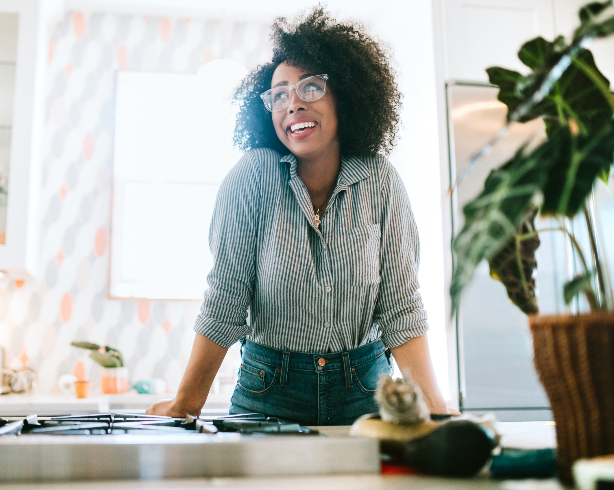 Woman smiling in her kitchen